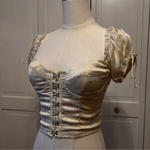 Pale yellow floral corset top